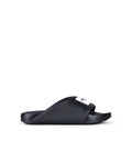 Label flat mules in rubber