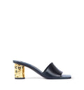 Tape heeled mules in leather