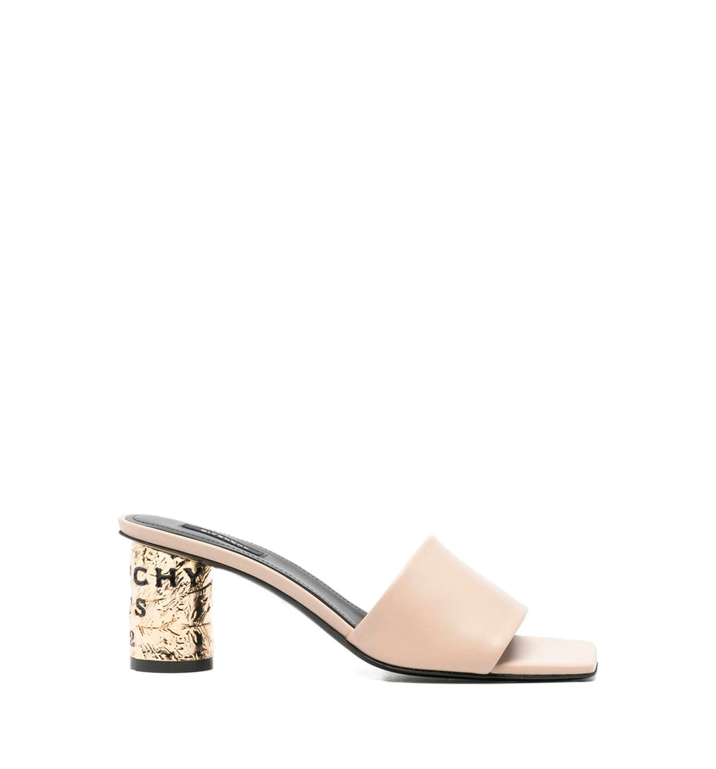 Tape heeled mules in leather