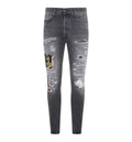 Ripped Patch Skinny Jeans
