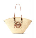 Large Anagram basket bag in iraca palm and calfskin