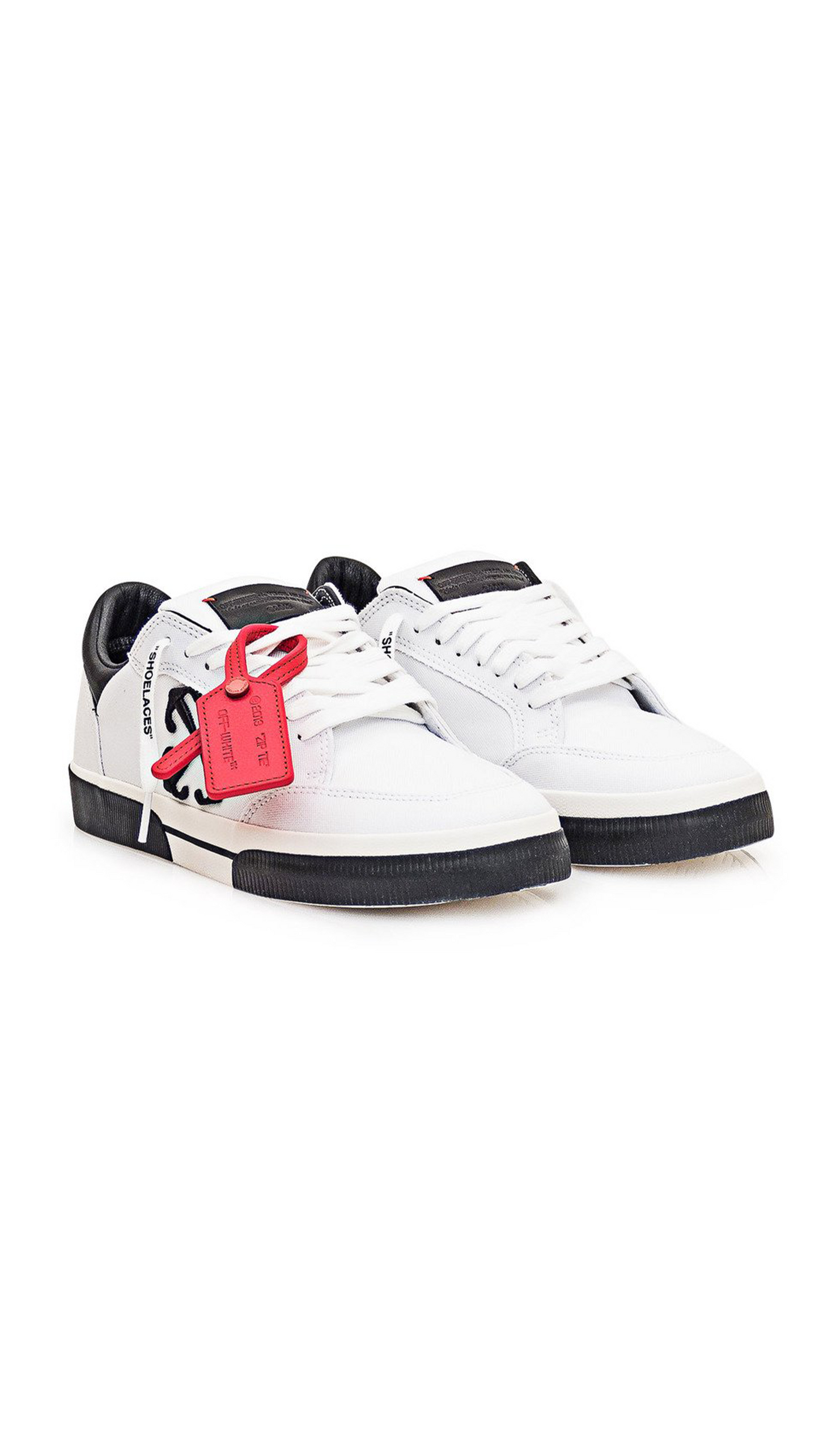 Low Vulcanize Sneaker in Canvas - White/Black