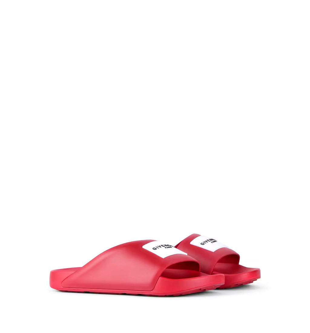Label Slide mules in rubber