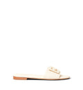 Parchment-colored leather slides