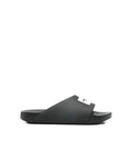 Label Slide mules in rubber