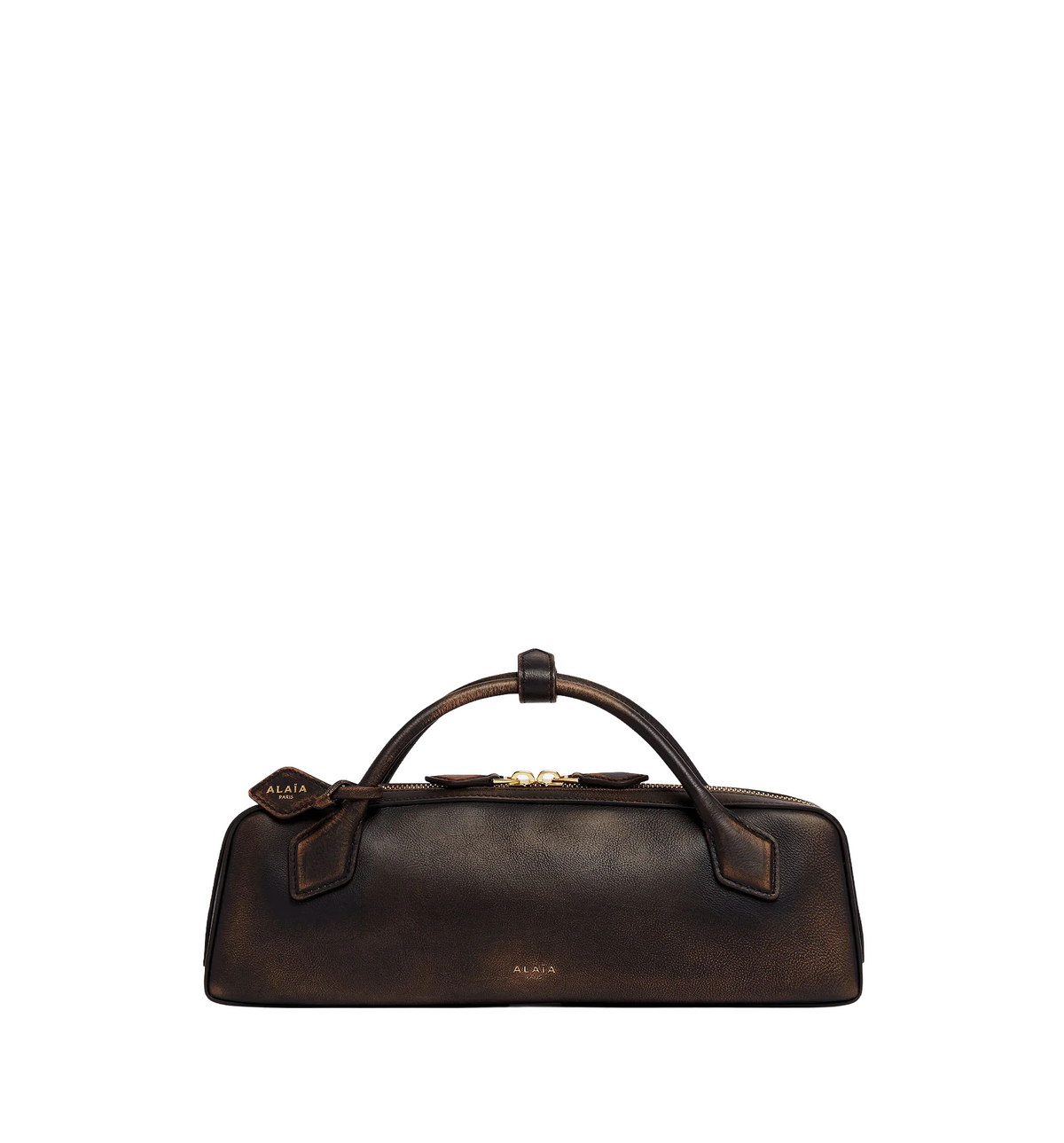 Le Teckel clutch in aged leather